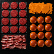 Kit Hamburguesero Tradicional 12 Personas — Hamburguesa res artesanal, pan brioche, cheddar y tocineta · La Carnicerie