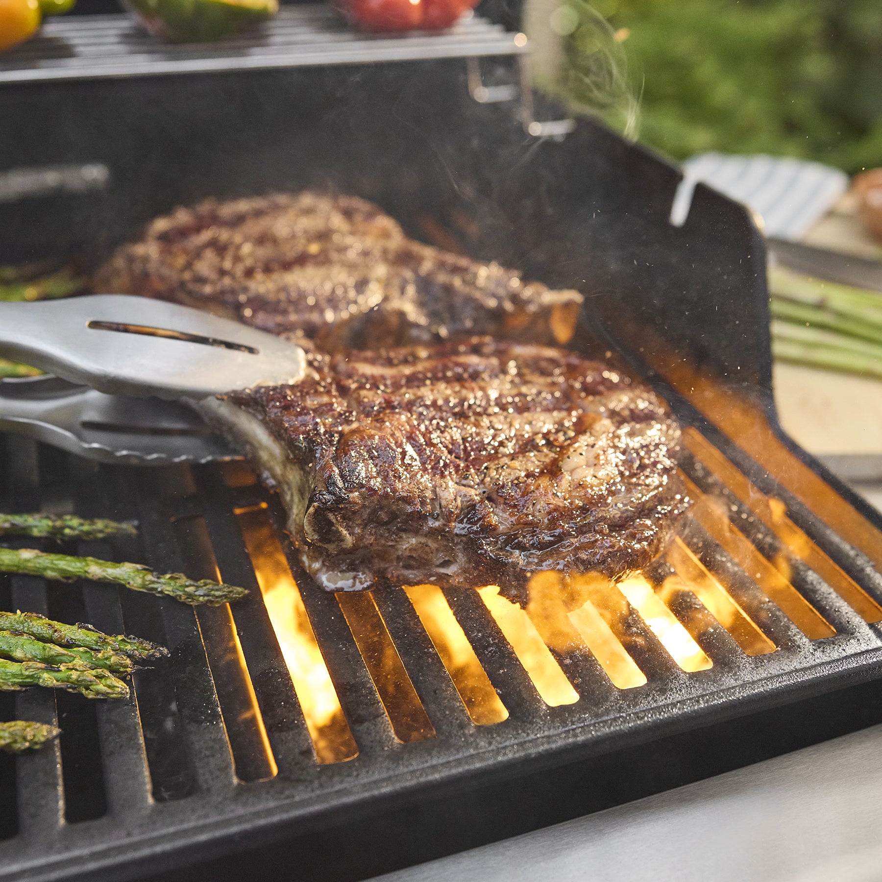 Weber Spirit E-325 vista frontal gas natural negro — La Carnicerie