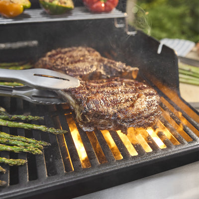 Weber Spirit E-425 vista lateral gas natural negro — La Carnicerie